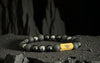 Rengetsu Enkan Flame Crown luxury Onyx men’s bracelet 17cm shown on black lava background – product photoshoot1