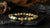 Rengetsu Jōmyaku Quiet Pulse luxury Agate men’s bracelet 16 cm displayed on black stone surface with decorative background – product photoshoot